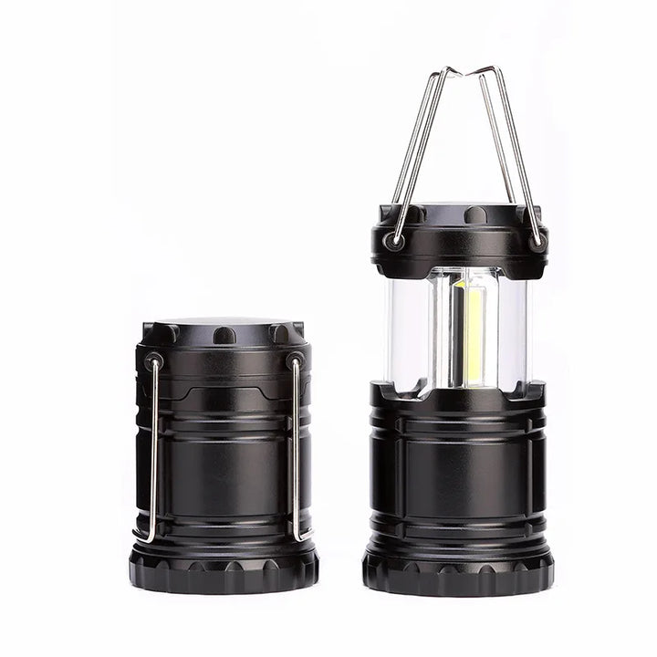 Compact LED camping lantern with bright COB light, perfect for outdoor hiking & emergency use.