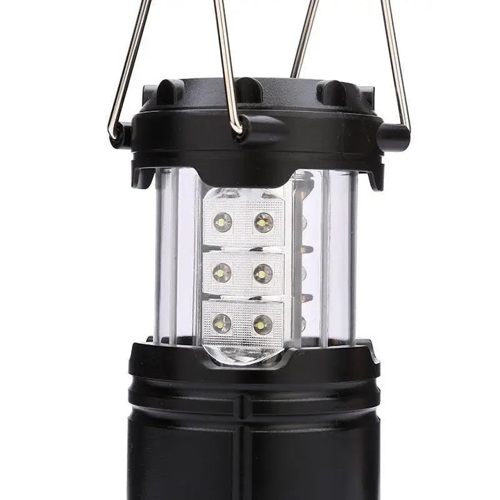 Portable GlowLite LED lantern featuring strong COB light, ideal for camping, hiking, and power outages.