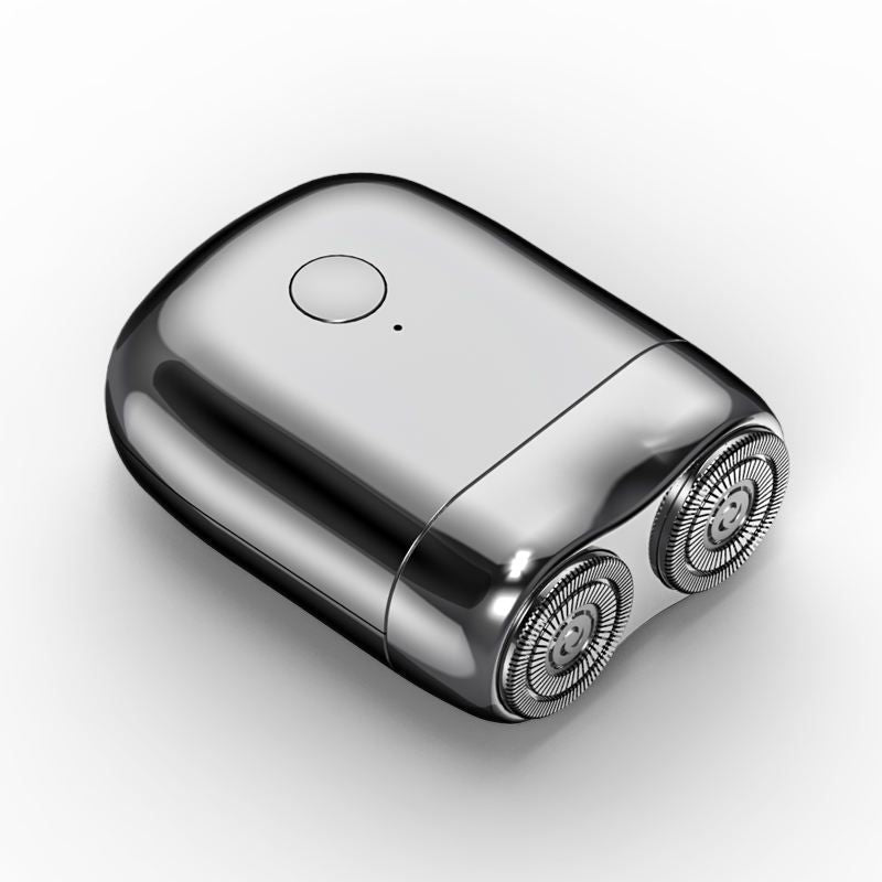 Magnetic waterproof men's electric shaver. Rechargeable mini travel razor for convenient personal care & grooming needs.