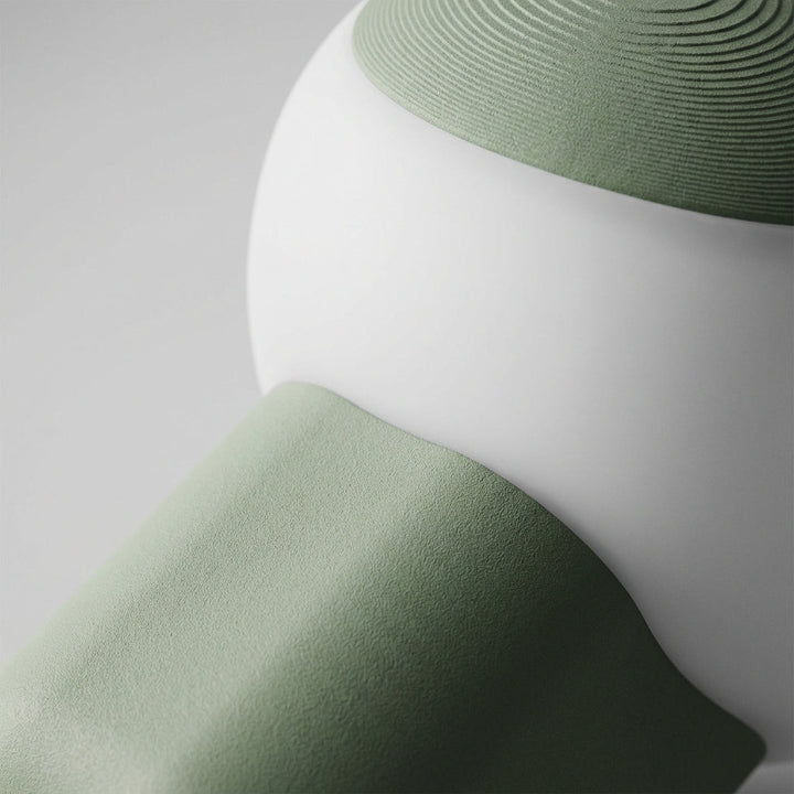 White Mushino LED mushroom table lamp on a nightstand, soft ambient light, bedroom decor.