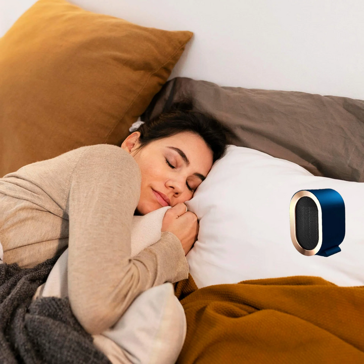 Unisex design portable electric heater, energy-efficient for personal room heating. Quiet & compact.
