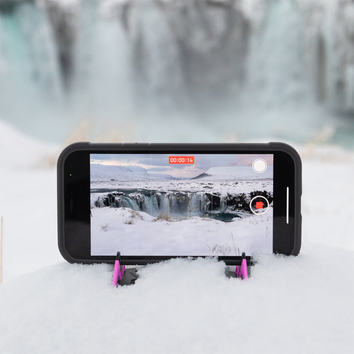 Versatile phone stand and tripod for desks, offering multiple viewing angles & stability.