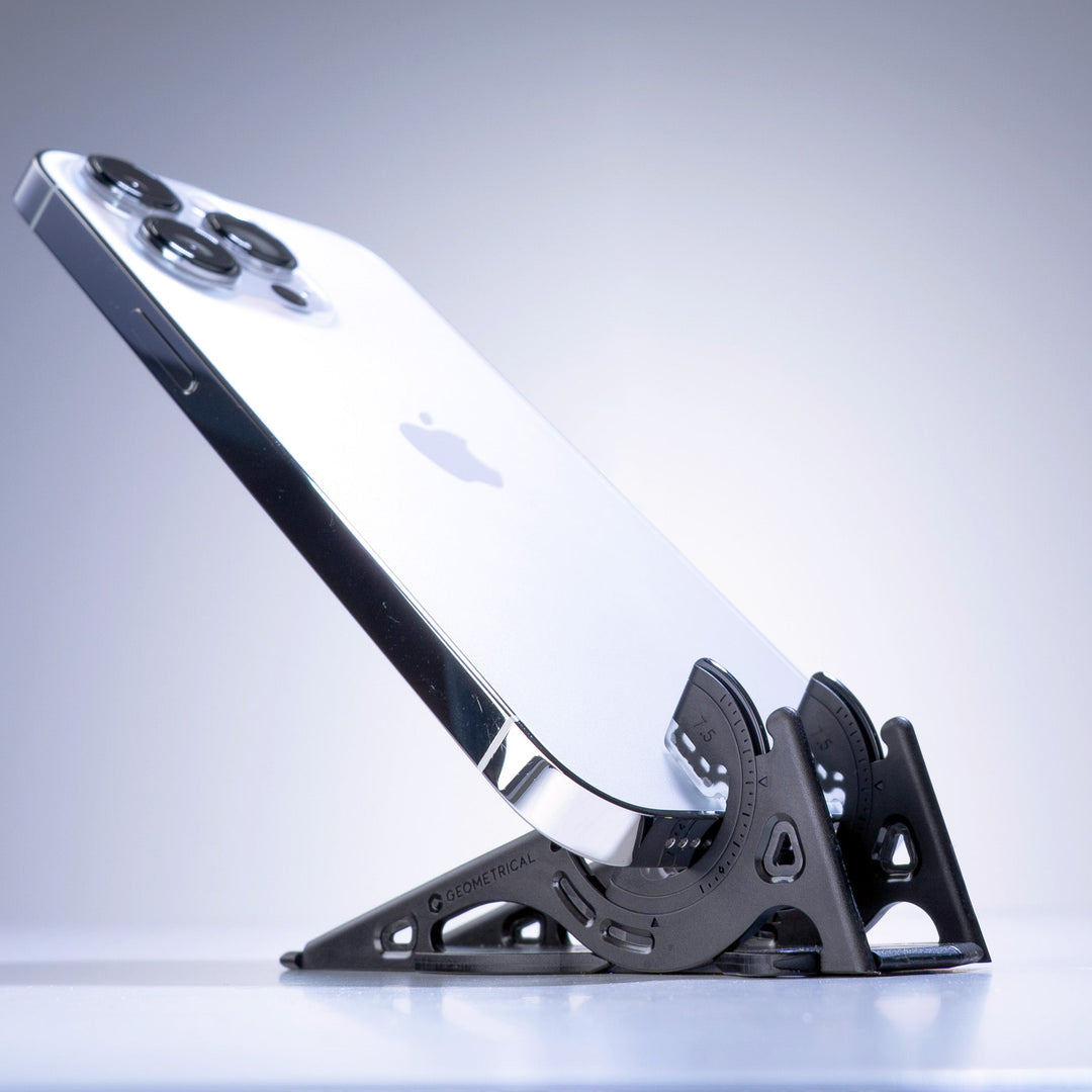 Compact phone stand and tripod combo, essential for hands-free viewing & creative shots.