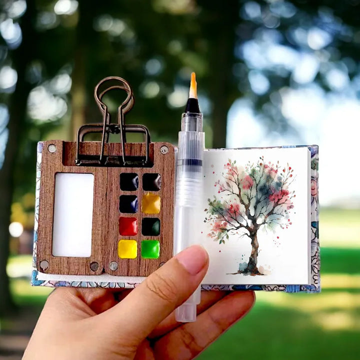 Compact portable watercolour art set for artists, ideal for creative travel and outdoor painting.