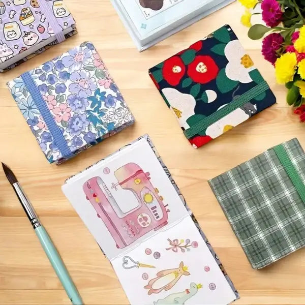 Close-up of vibrant watercolour paint pans within a compact artist's travel art set.