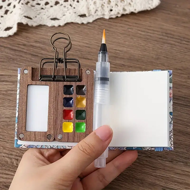 High-quality compact watercolour paint set, essential artist supplies for studio or plein air.