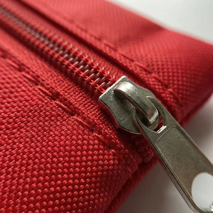 Durable tactical first aid bag for emergencies, compact medical kit for outdoor survival, camping & travel.