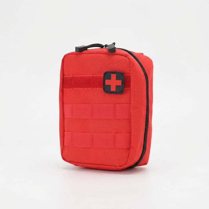 Green tactical first aid pouch, perfect for hiking, camping, and outdoor adventures. A compact survival & medical kit.