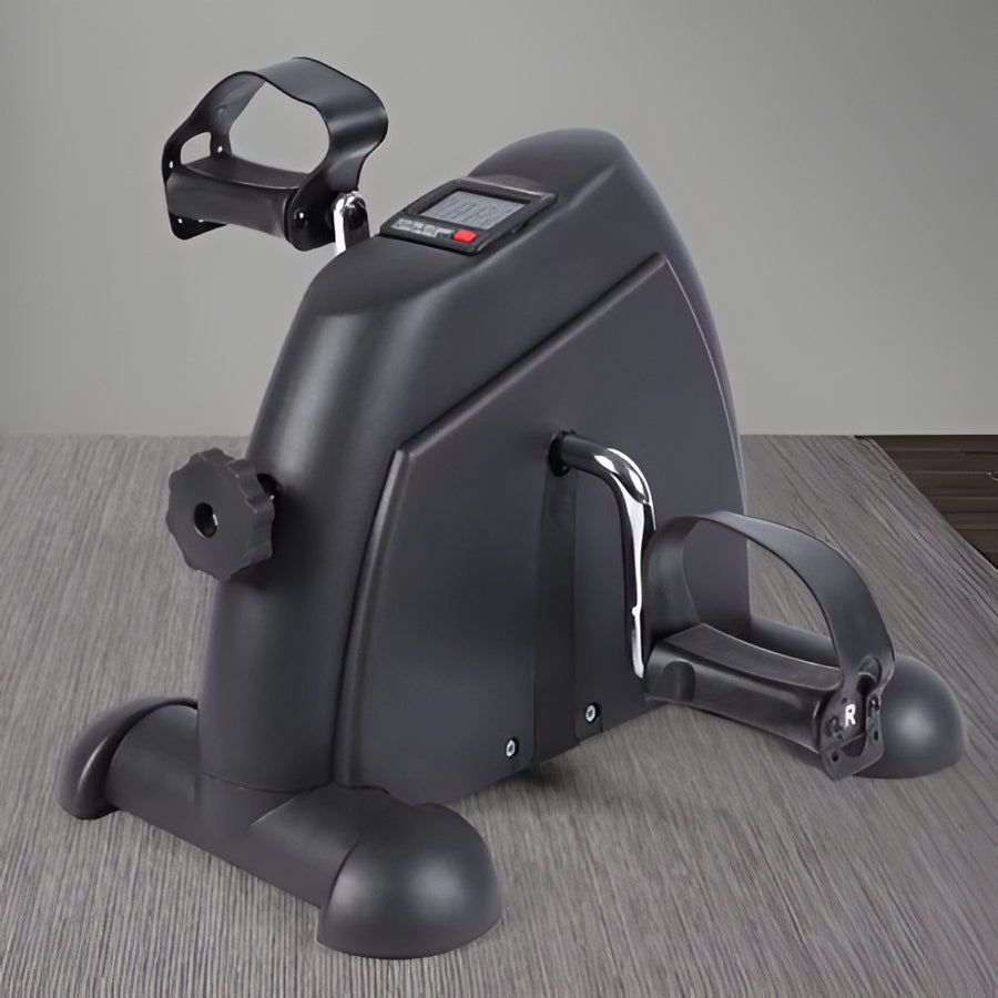 Compact unisex pedal exerciser with LCD for desk workouts & home fitness. Ideal for low-impact rehabilitation.