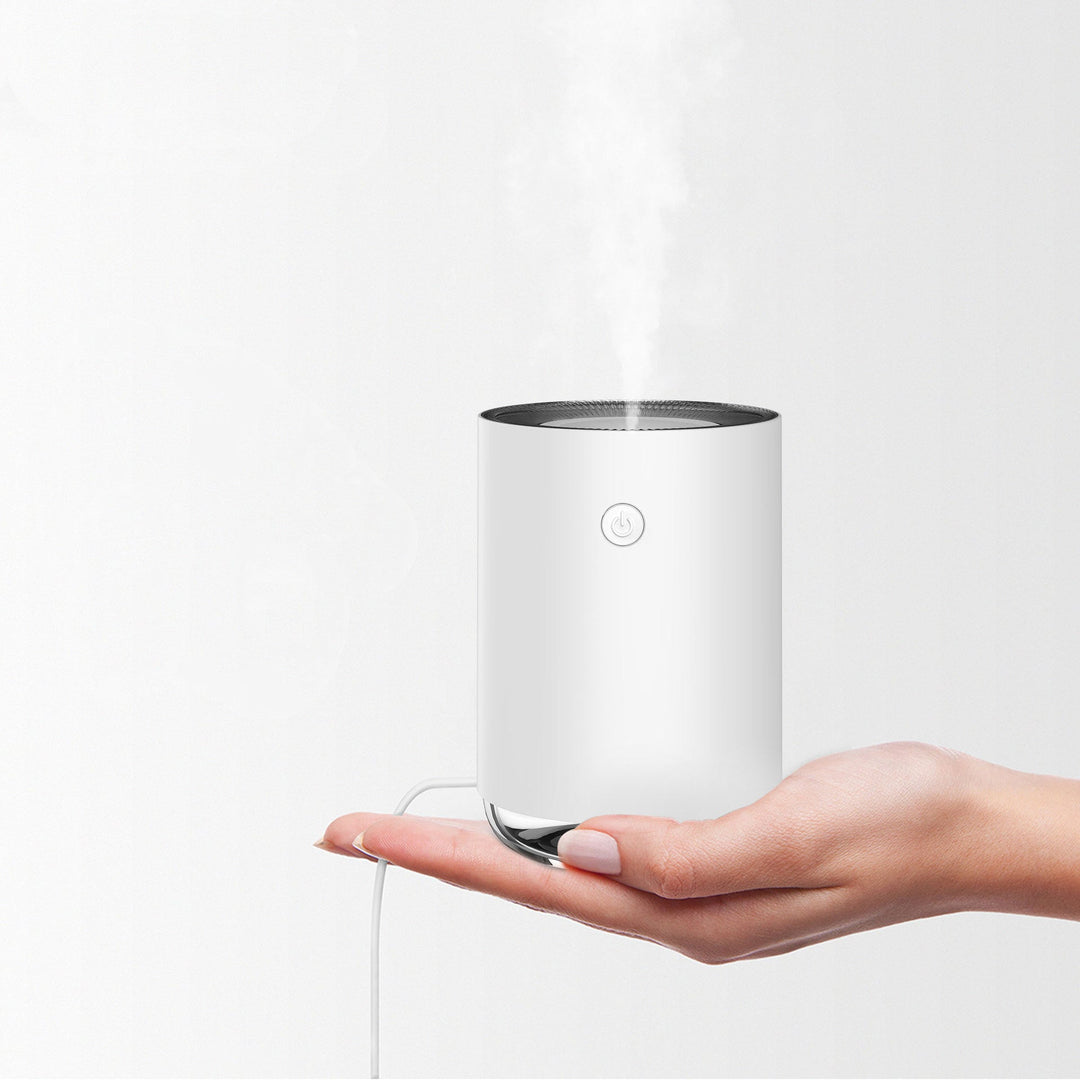Sleek compact humidifier lamp. Creates a comfortable, moisturized environment for personal wellness and better air.