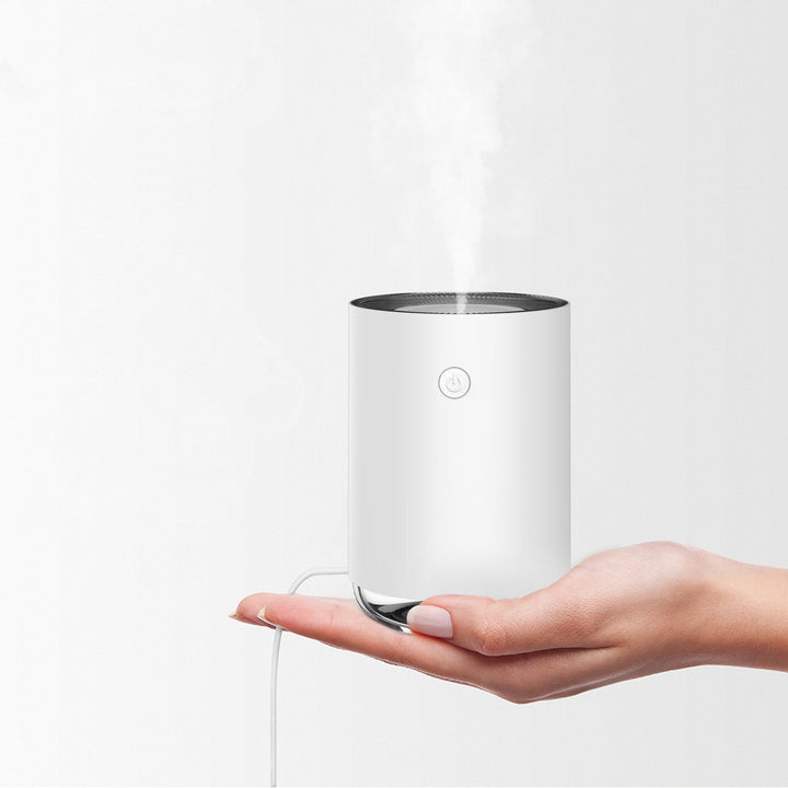 Sleek compact humidifier lamp. Creates a comfortable, moisturized environment for personal wellness and better air.