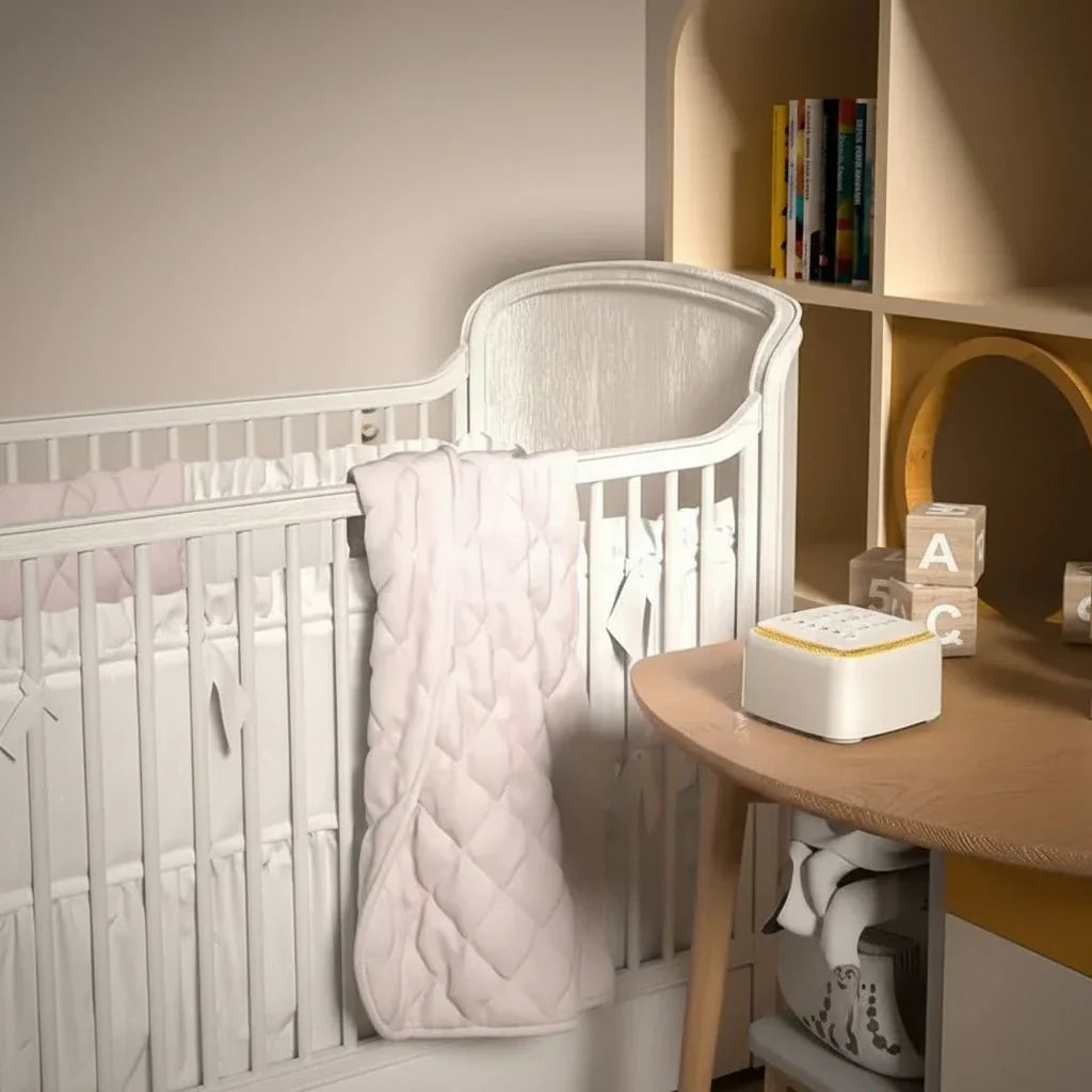 White noise sound machine, perfect nursery aid for baby sleep. Creates calming sounds for peaceful infant rest.