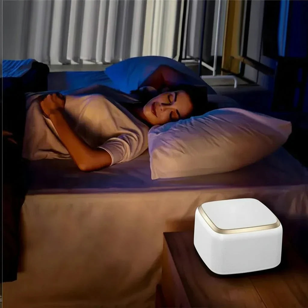 Portable white noise sleep machine, ideal travel essential for relaxation & deep sleep on the go.