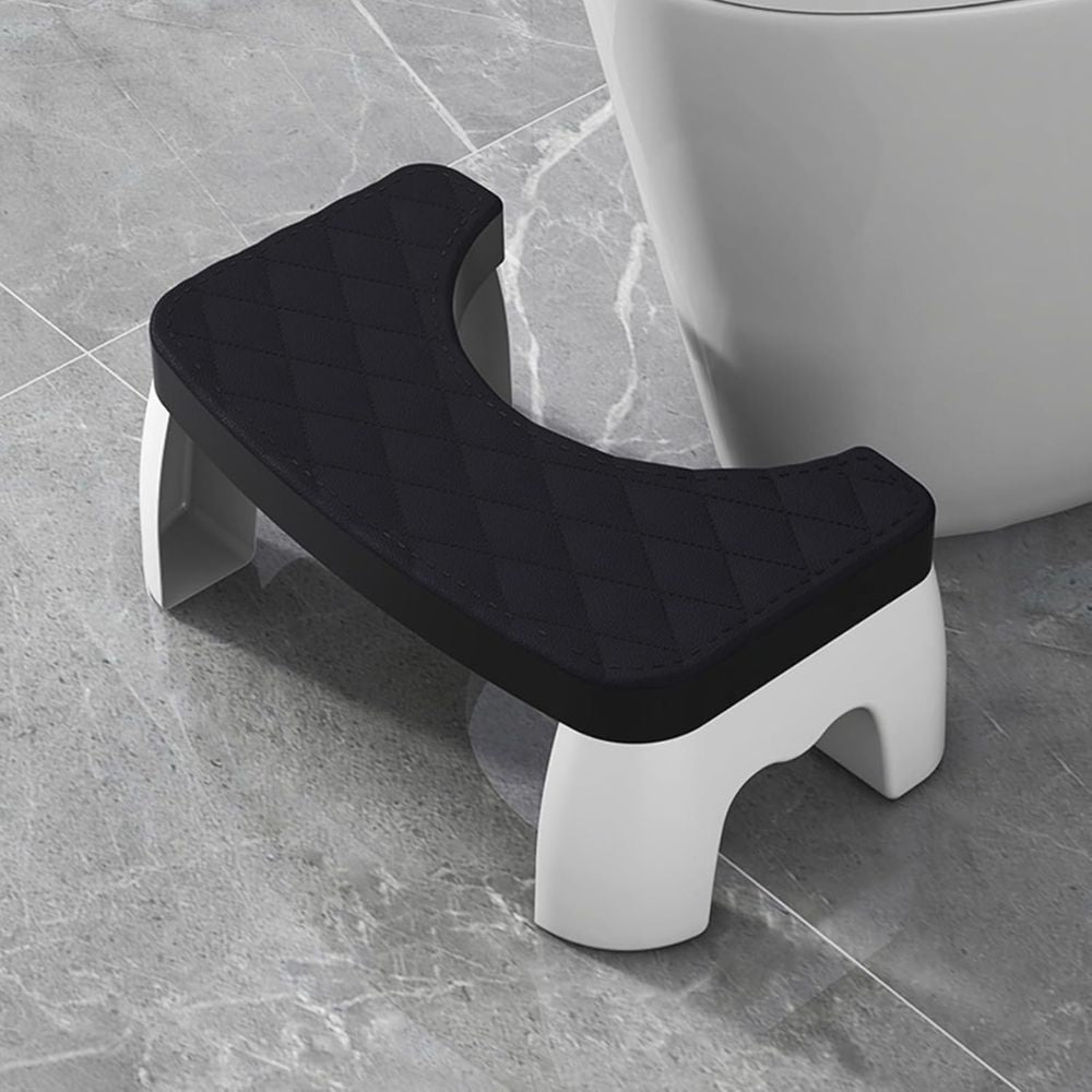 Modern blue plastic non-slip toilet squat stool. Compact bathroom accessory for comfortable & healthy posture.