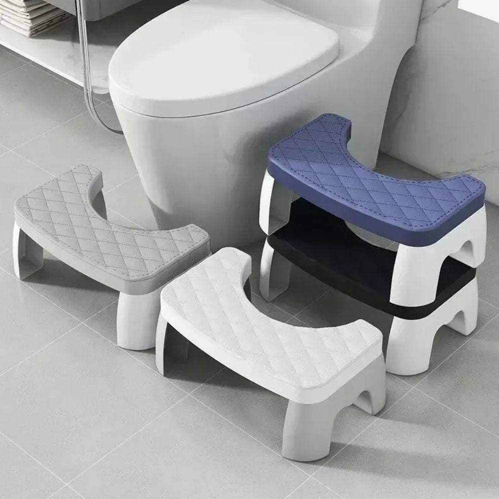 Unisex white non-slip squat aid stool for toilets, improving posture, colon alignment & digestive wellness at home.