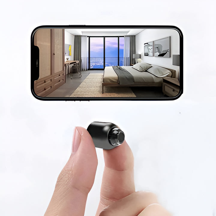 Compact WiFi home security camera, 1080p HD, night vision, & motion detection for surveillance.