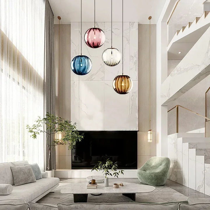 Sleek Nordic style LED pendant light with a clear glass globe, perfect for modern home decor.