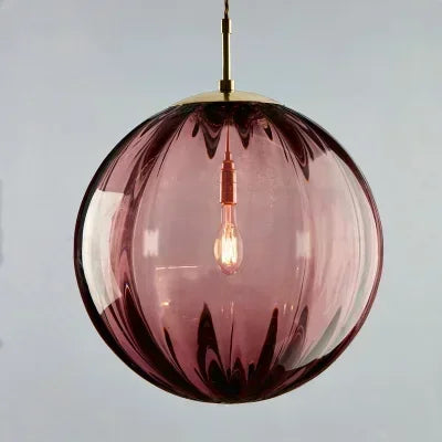 Energy-efficient LED contemporary pendant light with a decorative glass globe, ideal for modern homes.