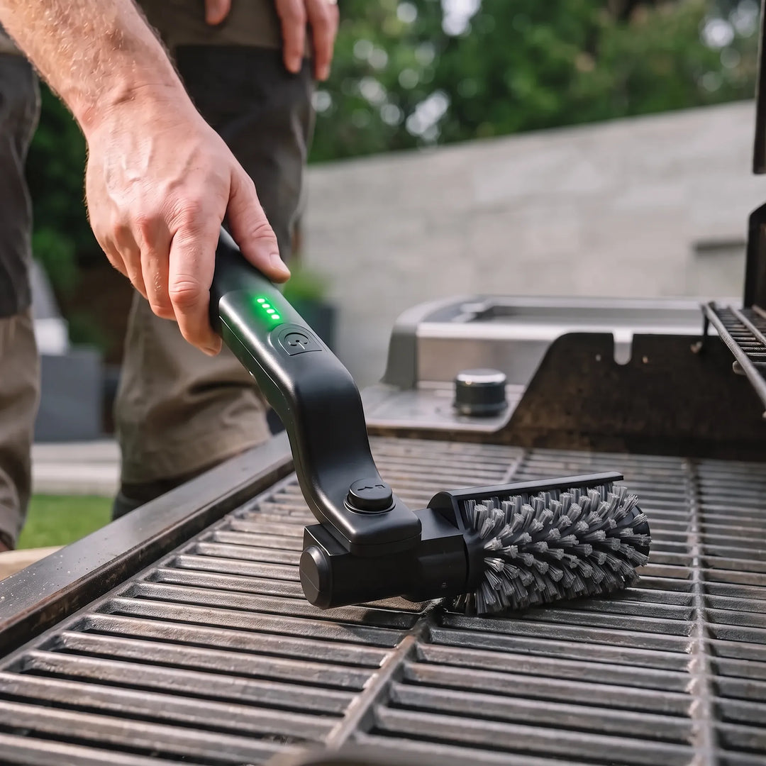 Cordless electric grill brush for powerful BBQ cleaning. Heavy-duty rotary design, essential outdoor kitchen accessory.