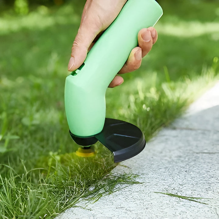Effortless cordless mini edge trimmer for precise lawn care. Portable, lightweight gardening tool for quick yard maintenance.