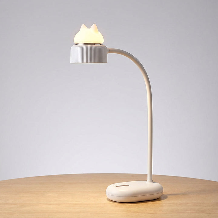 Softly lit Cosypaw cat nightlight, USB rechargeable, designed for safe and soothing bedtime.