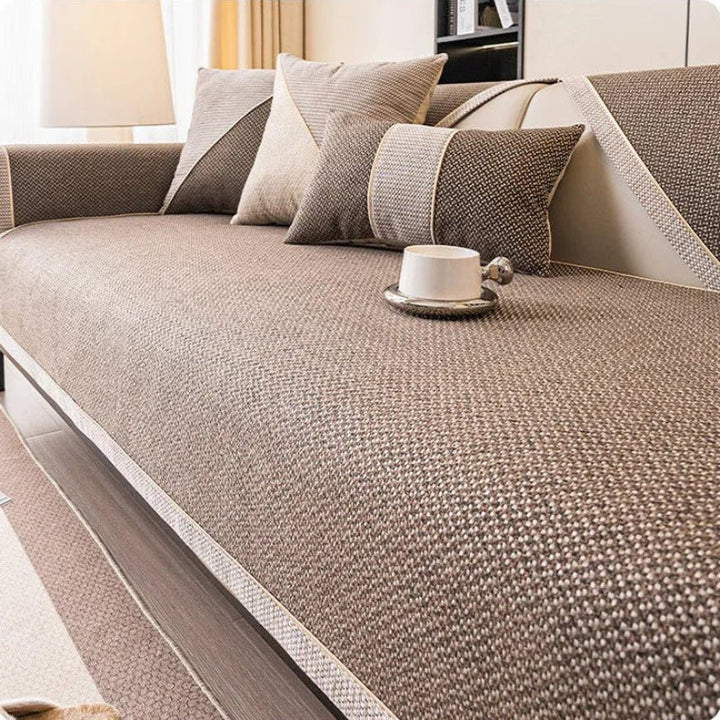 Comfortable cotton-linen sofa protector, soft & non-slip design for family-friendly living rooms.