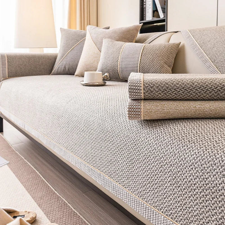Stylish cotton-linen throw cover, enhancing living room decor with a non-slip design.