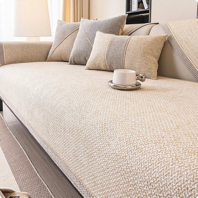 Easy-care cotton-linen couch shield, machine washable & non-slip for a clean, protected sofa.