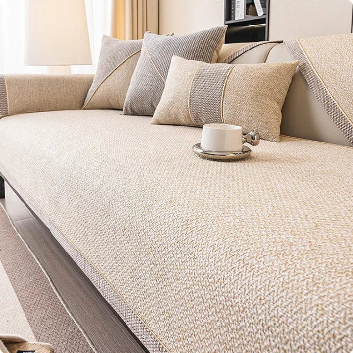 Easy-care cotton-linen couch shield, machine washable & non-slip for a clean, protected sofa.