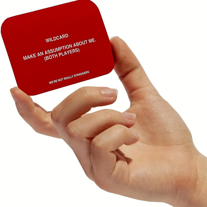Couple holding SoulConnect cards, enjoying a fun date night & building intimacy.