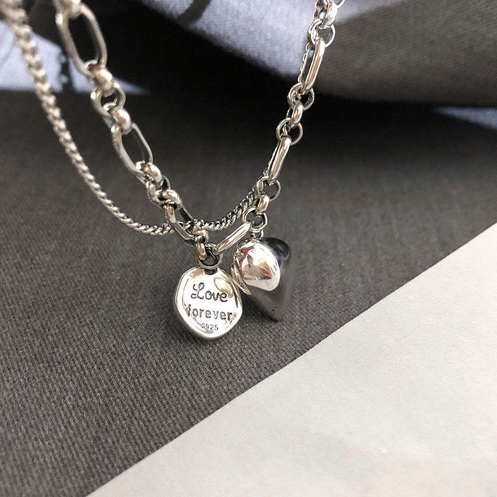 A couple showcasing their adjustable stainless steel love bracelets. Matching romantic duo jewelry for relationships.