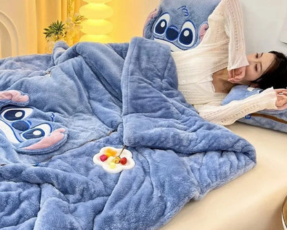 Cozy sofa throw blanket and cartoon cushion. Soft fleece for relaxation.