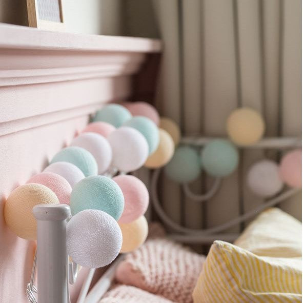Decorative cotton ball lights creating a magical atmosphere for special events & room styling.