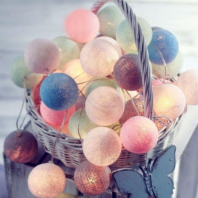 Battery operated cotton ball string lights, portable ambient lighting for home or parties.