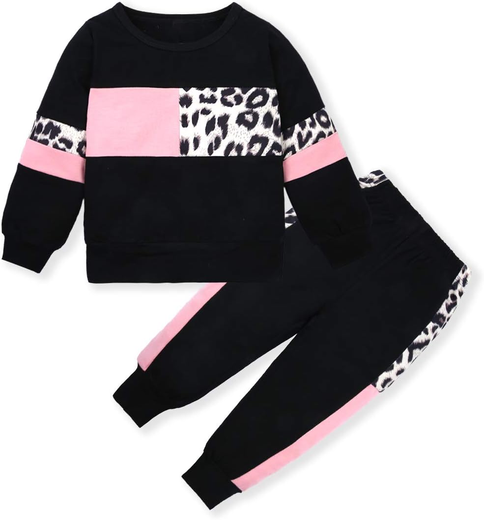 Girls' winter outfit: a cozy cotton sweater and matching trousers.