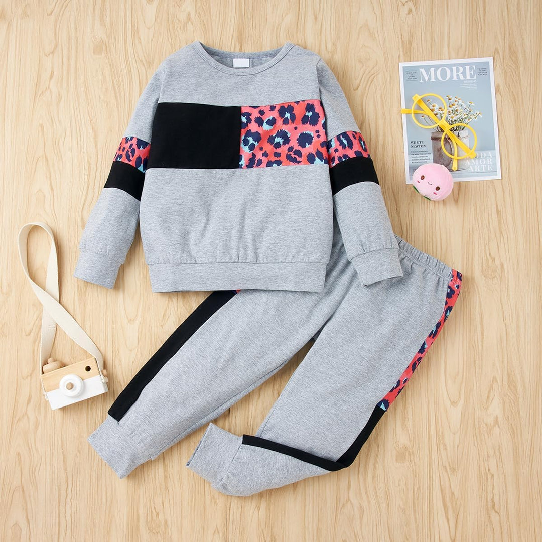 Fashionable girls' cotton sweater and trouser set, a complete outfit.