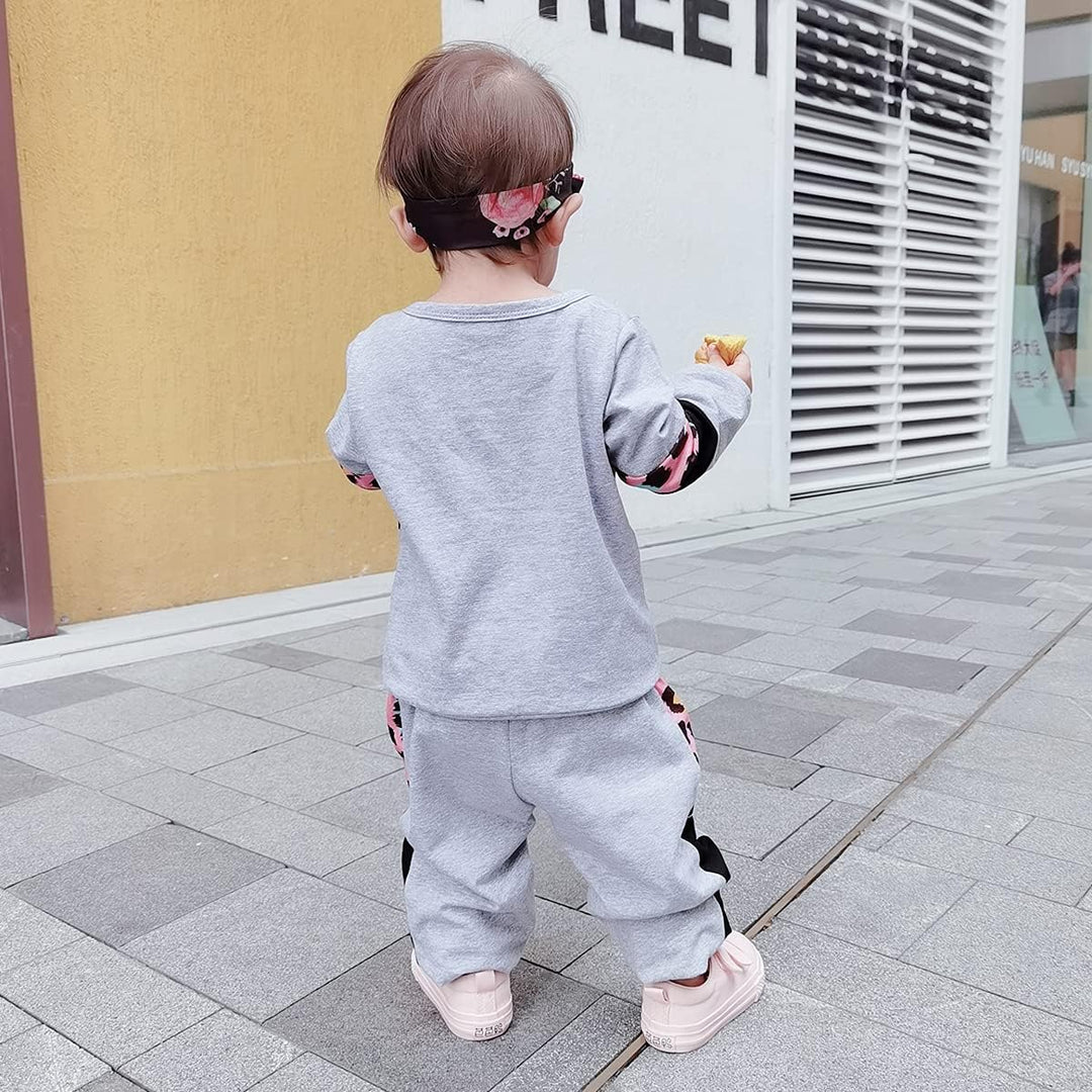 Sweet baby girls' cotton sweater and trouser set, lovely for gifting.