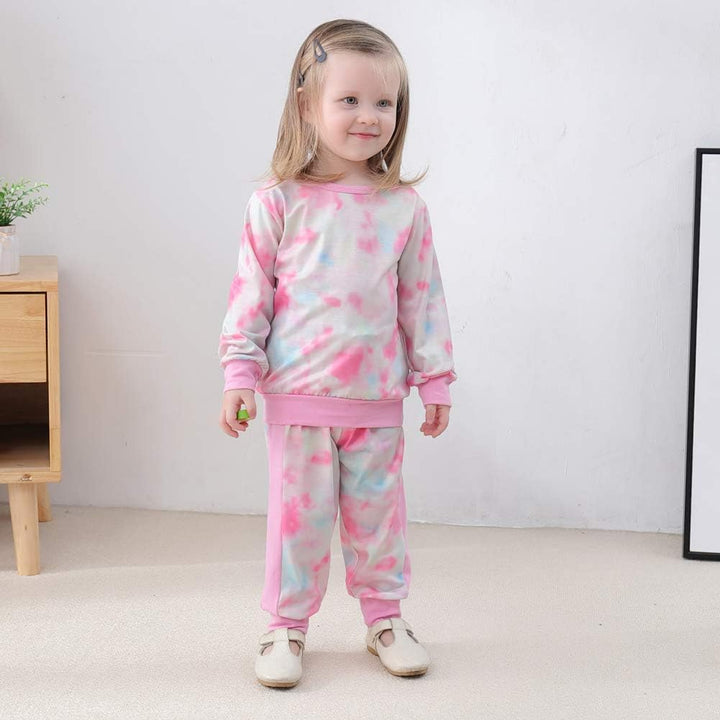 Girls' solid color cotton sweater and trouser set, buildable basics.