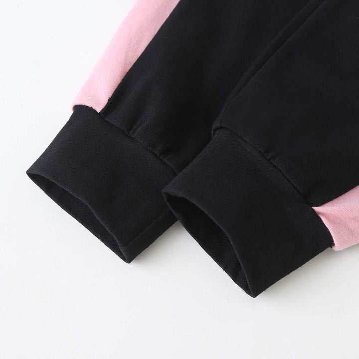 Girls' striped cotton sweater and plain trousers set, charming design.
