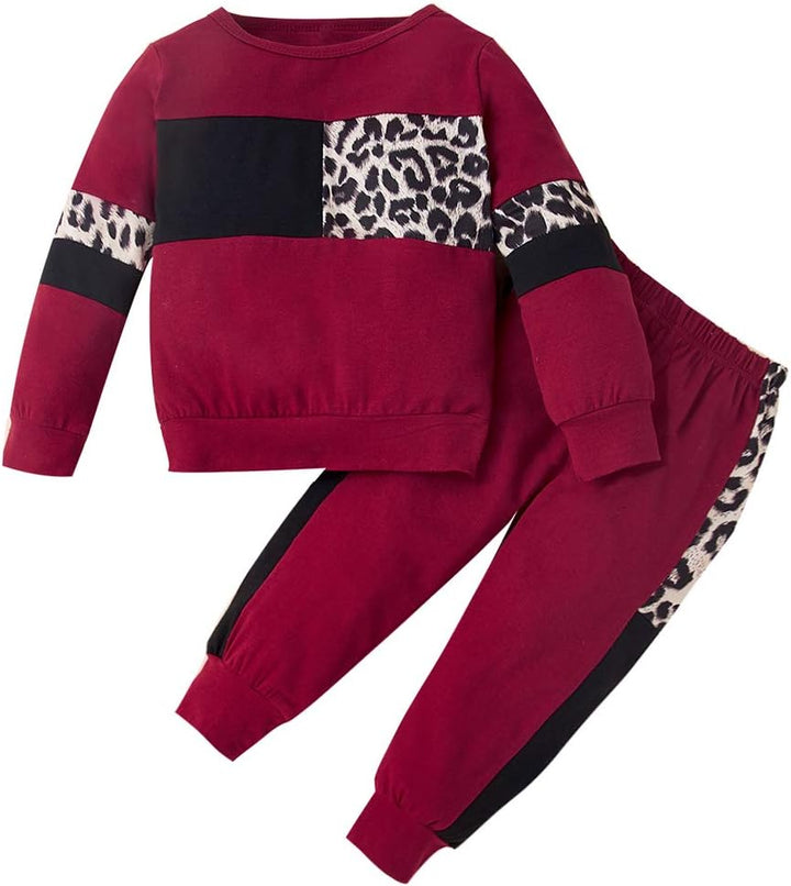 Soft knit cotton sweater and coordinating trousers for baby girls' winter wear.