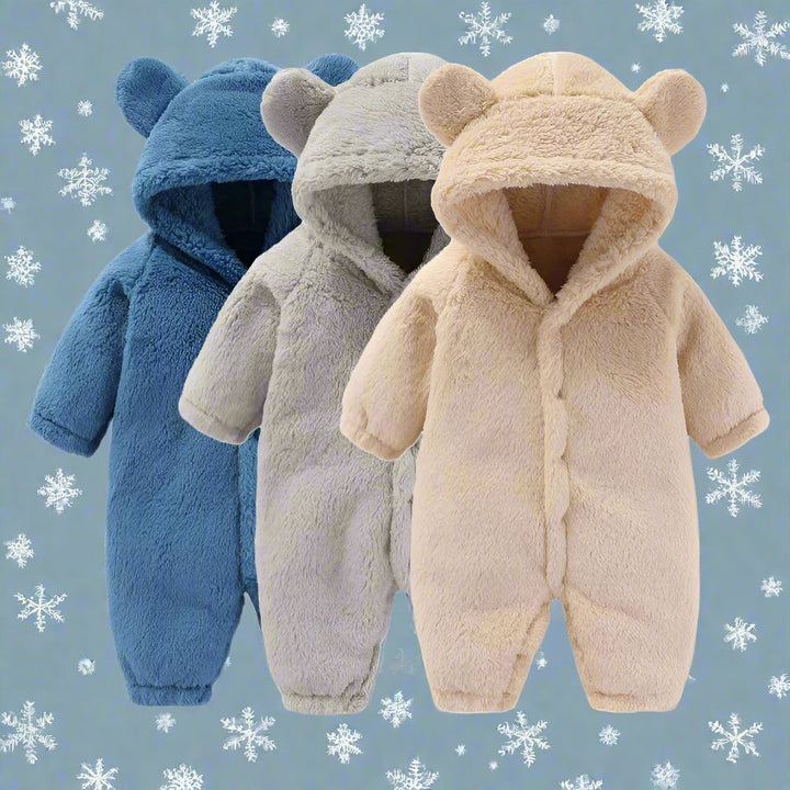 Cozy CuddleCub fleece onesie for baby & toddler. Warm hooded jumpsuit, perfect for winter sleepwear.