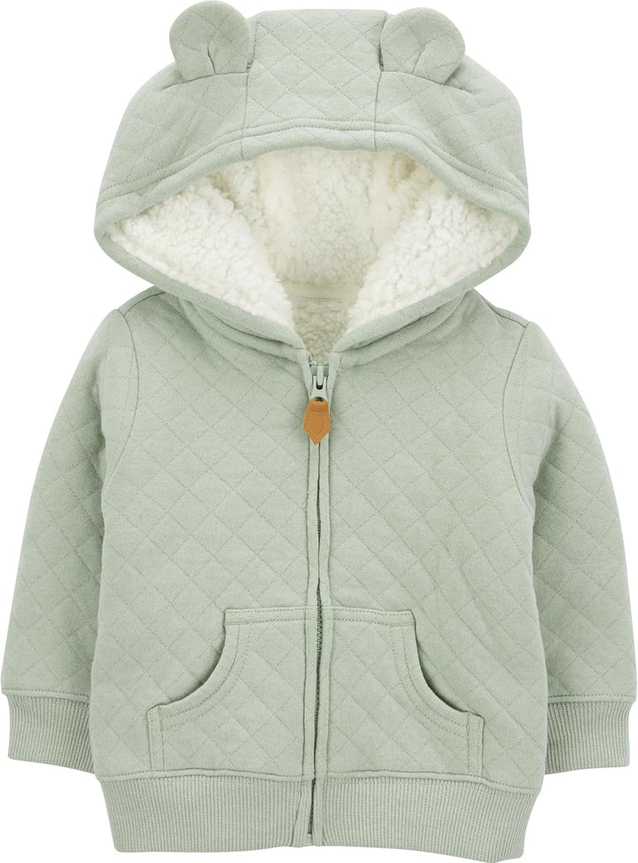 Close-up of the sherpa lining inside a gray fleece baby hoodie, showing warmth and softness.