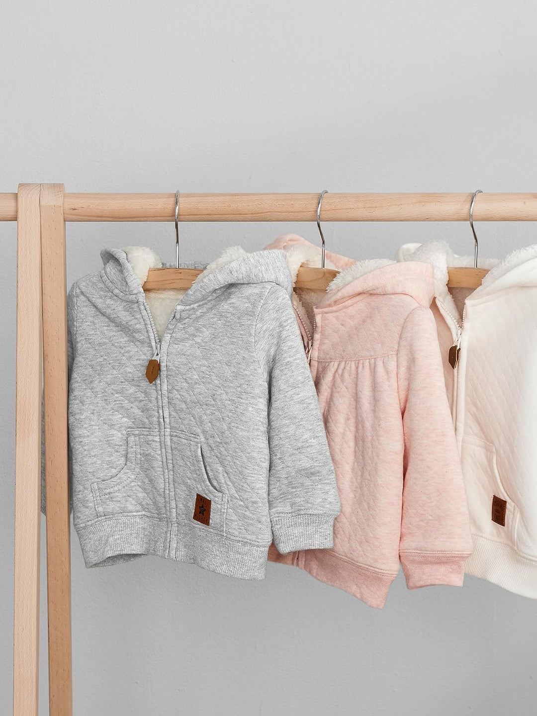 Soft touch baby hoodie, fleece-lined for ultimate comfort, a must-have for winter baby gear.