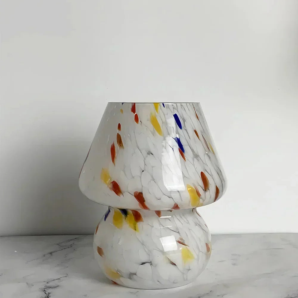 Stylish glass mushroom lamp, provides ambient lighting. A unique decorative piece for any home.