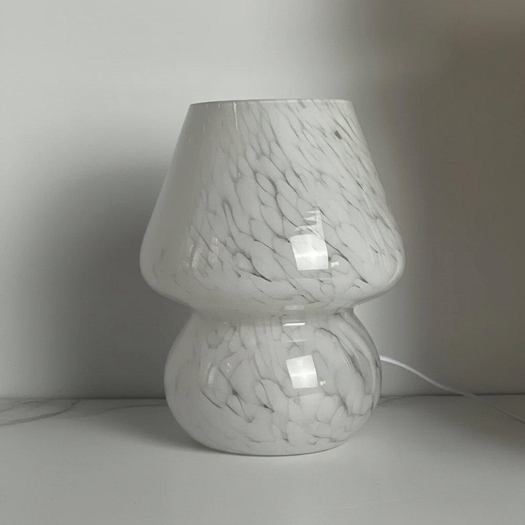 Handcrafted glass mushroom lamp, perfect for decorative home lighting. Warm, soothing glow.