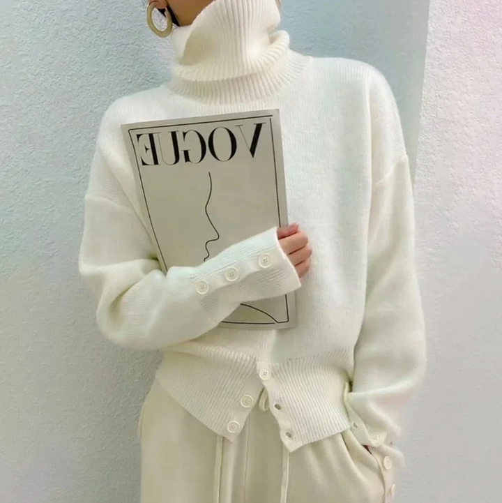 Cozy ivory turtleneck sweater for women, a soft knit long-sleeve top perfect for winter and fall fashion.