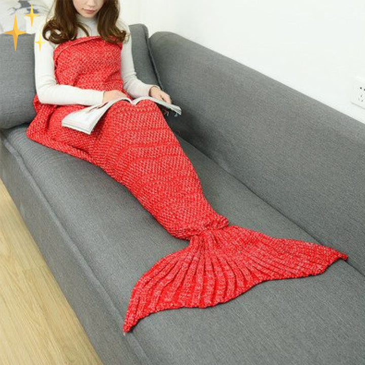Cozy knitted mermaid tail blanket for adults & kids. Soft, unisex throw, perfect for comfortable lounging.