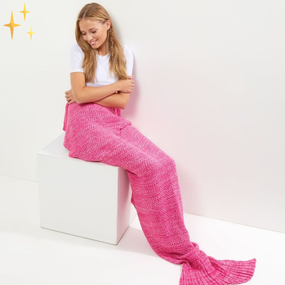 Unique knitted mermaid tail blanket, ideal gift for kids & adults. Comfortable, soft throw for cozy lounging.