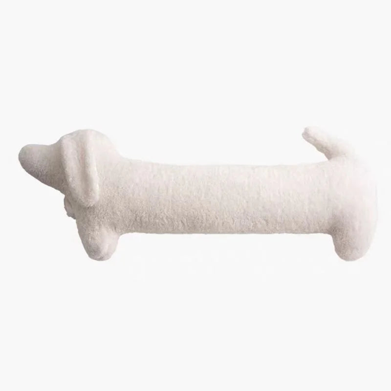 Stylish long Dachshund pillow on a couch, cozy boucle texture, unique accent for any room.