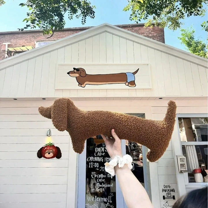Plush long Dachshund pillow, cozy & huggable for home decor, stylish accent with boucle fabric.